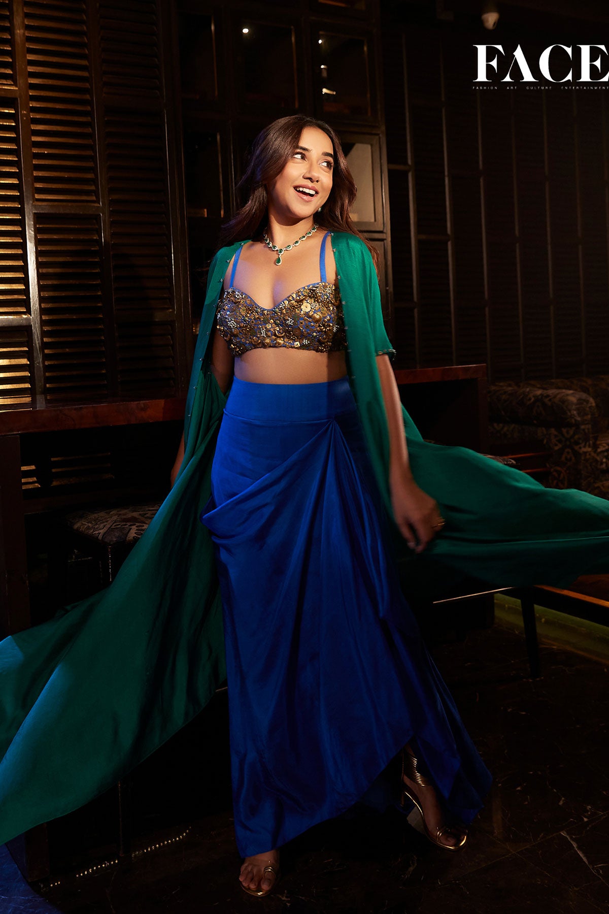 Prajakta Koli in Gold aqua drape skirt and cape set