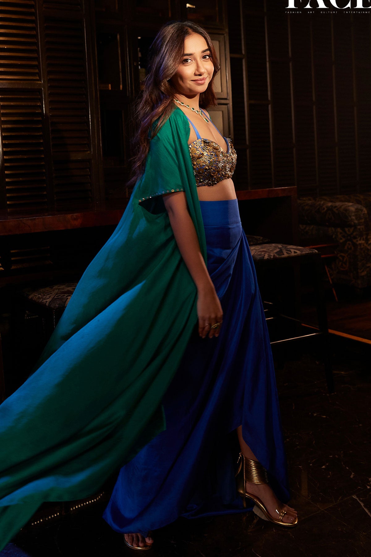 Prajakta Koli in Gold aqua drape skirt and cape set