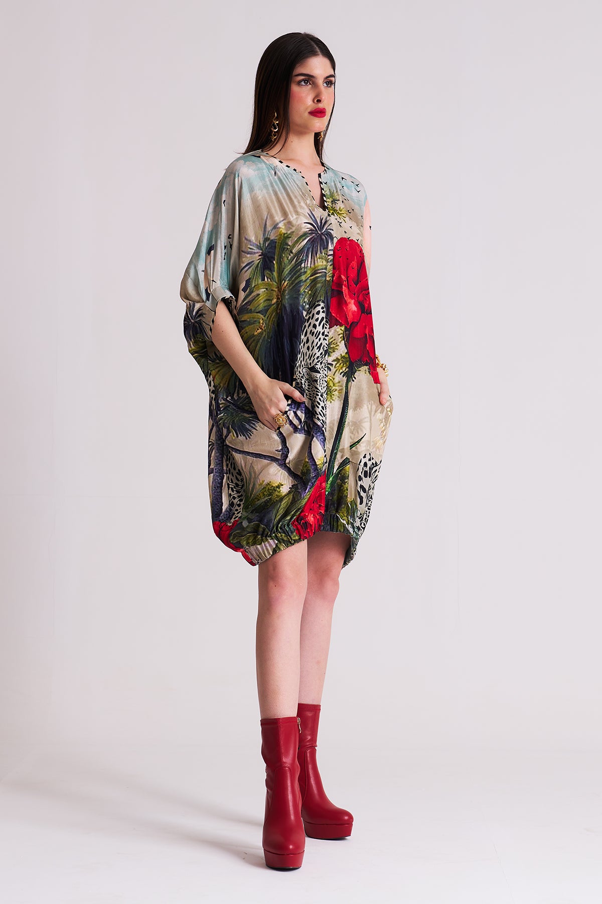 Dress with elasticated hem