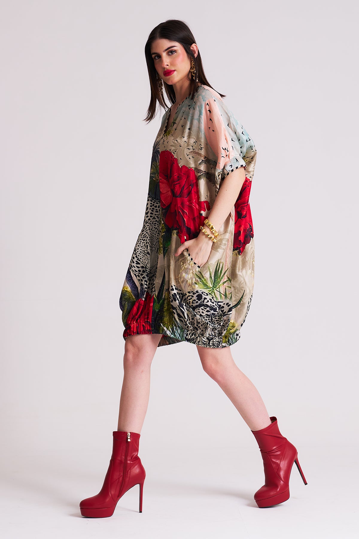 Dress with elasticated hem