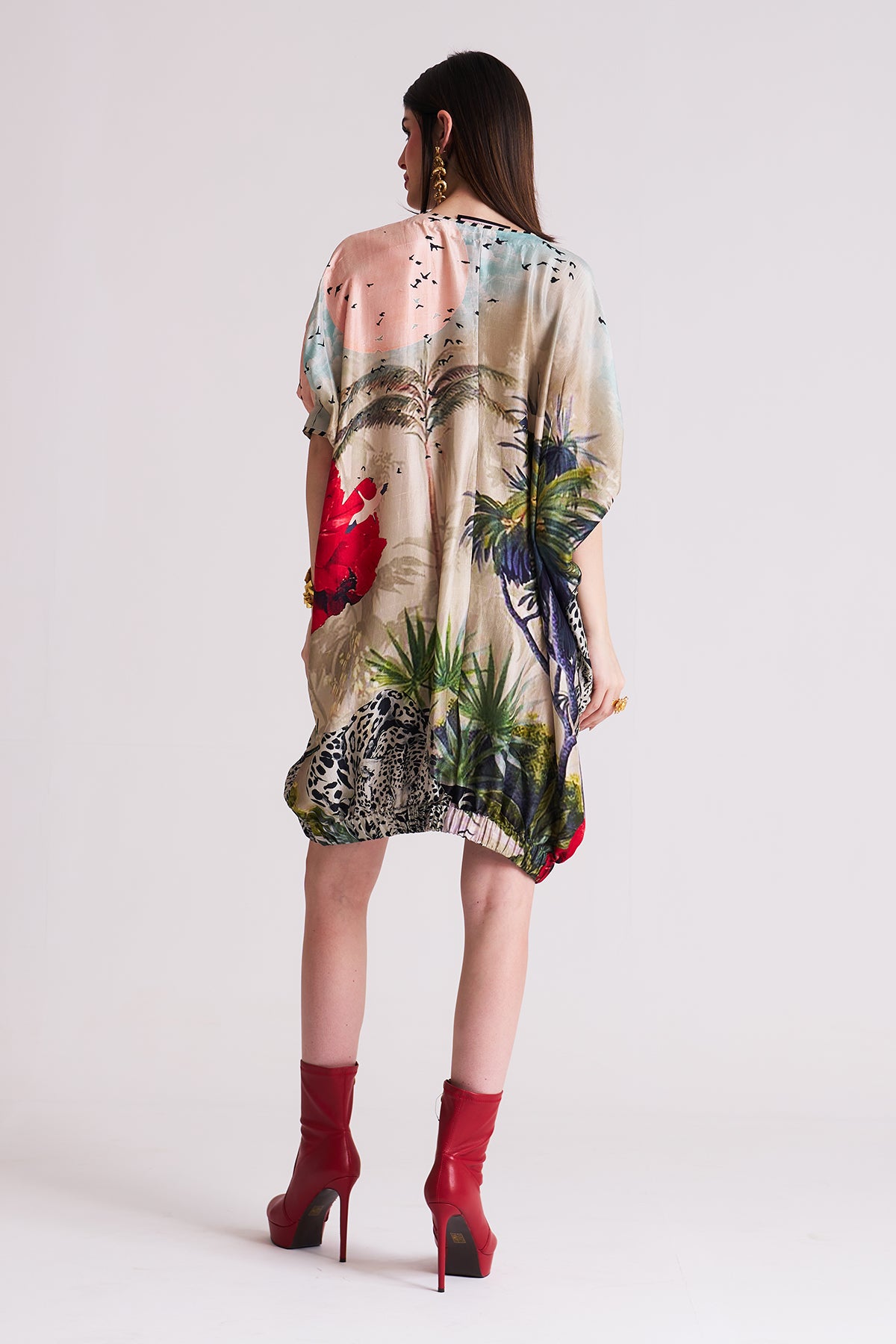 Dress with elasticated hem