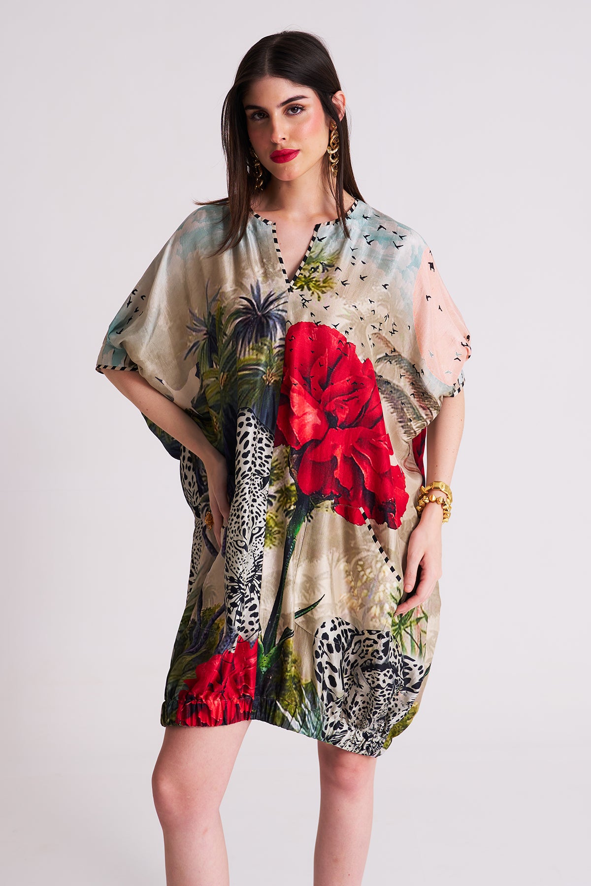 Dress with elasticated hem