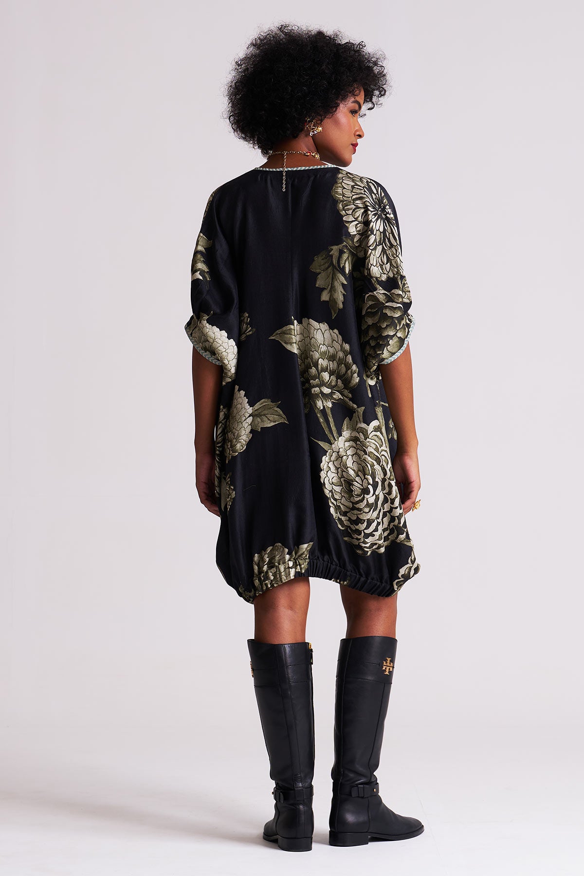 Dress with elasticated hem