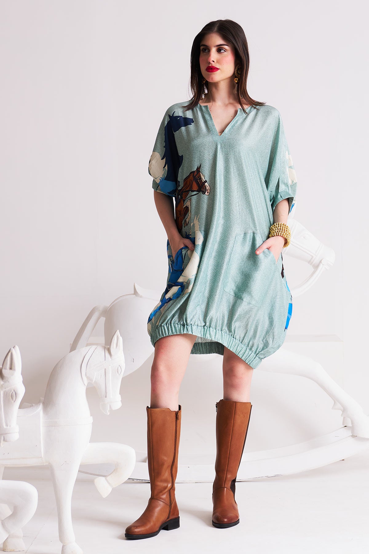 Dress with elasticated hem