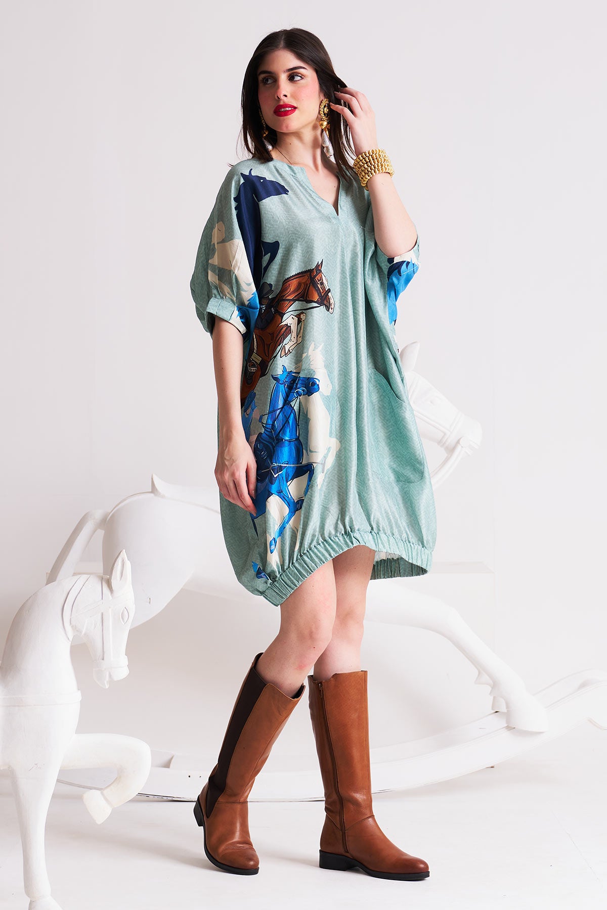 Dress with elasticated hem