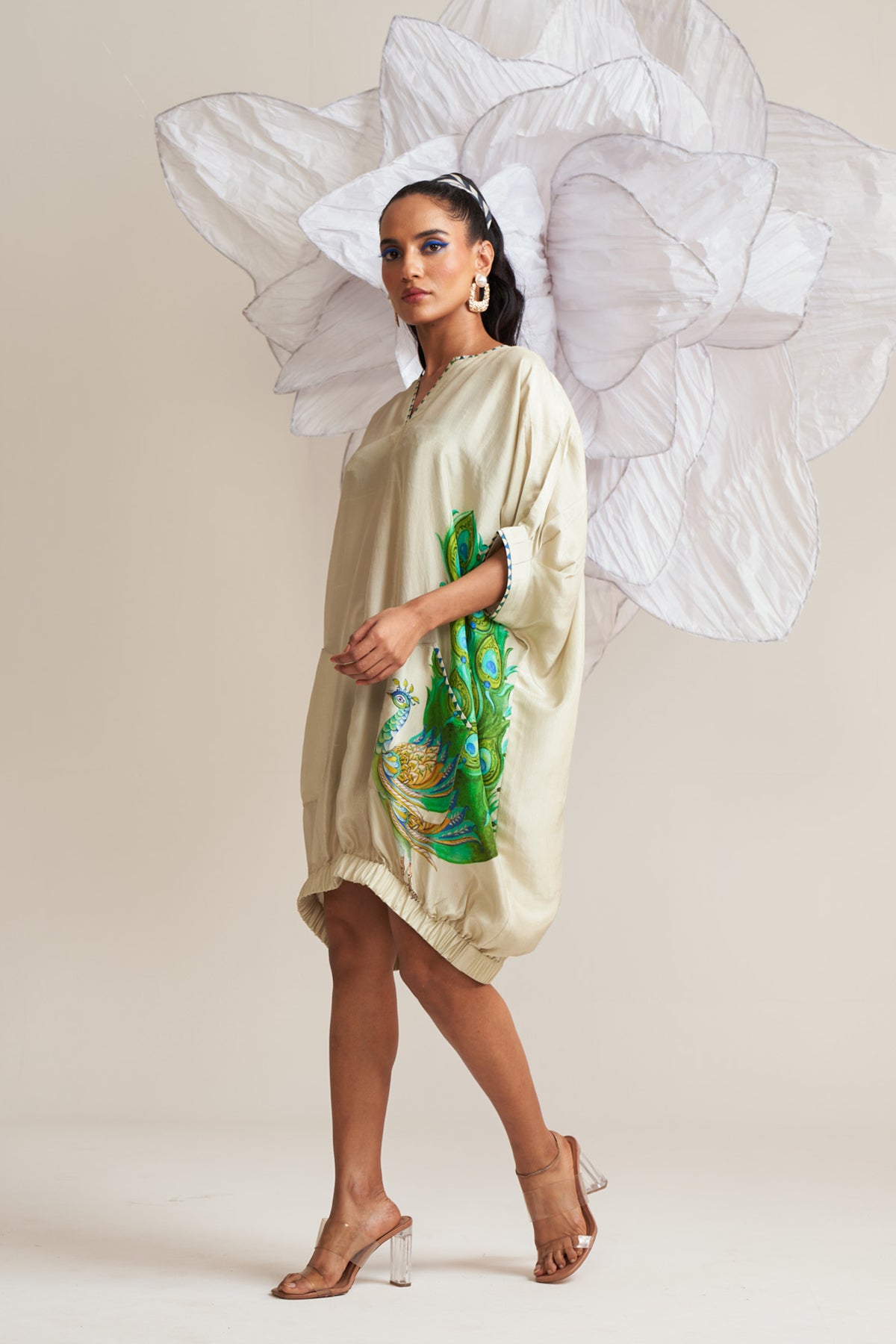 Dress with elasticated hem