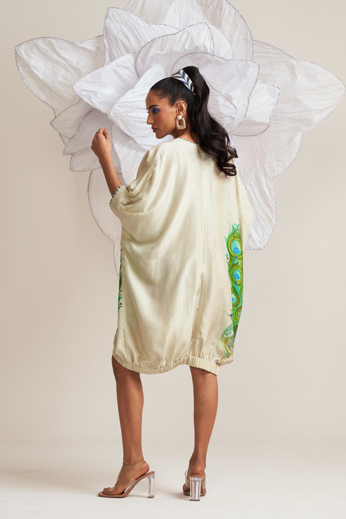 Dress with elasticated hem