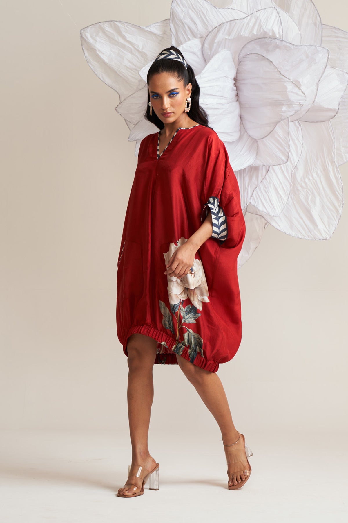 Dress with elasticated hem