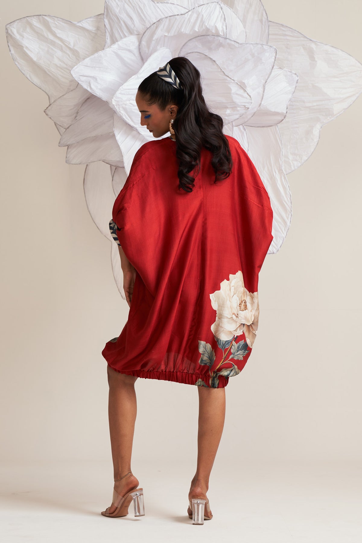 Dress with elasticated hem