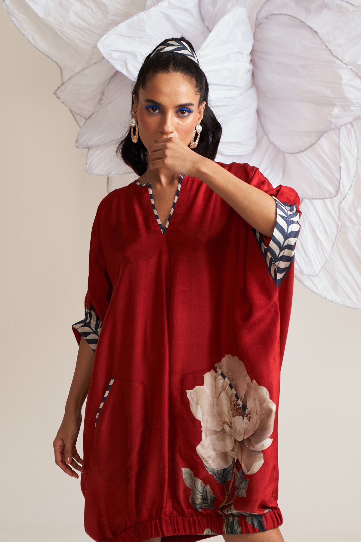 Dress with elasticated hem