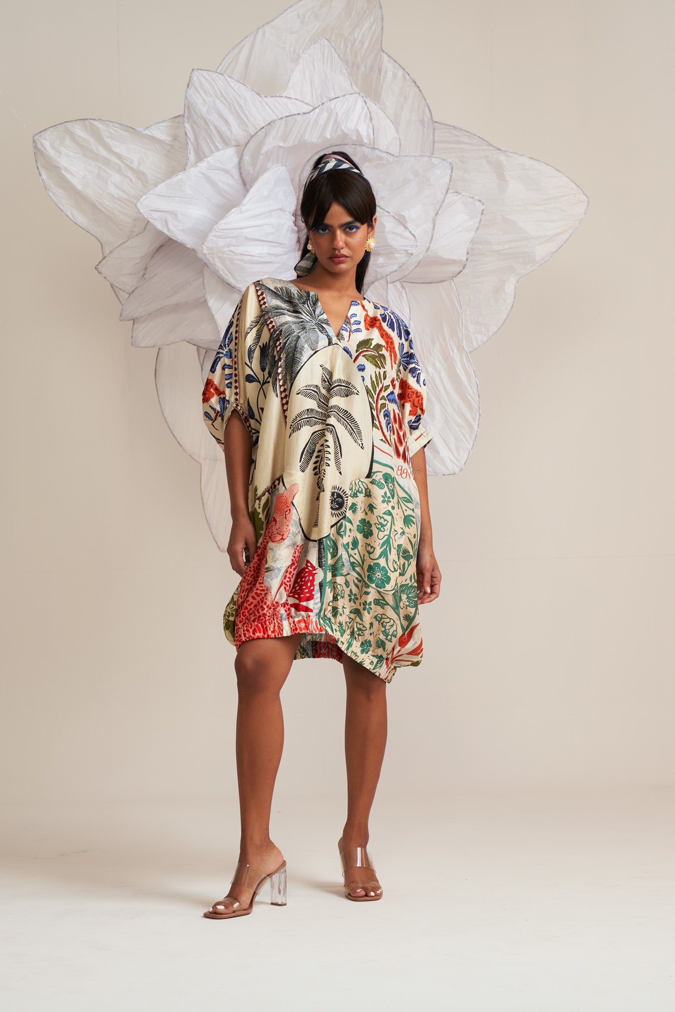 Dress with elasticated hem