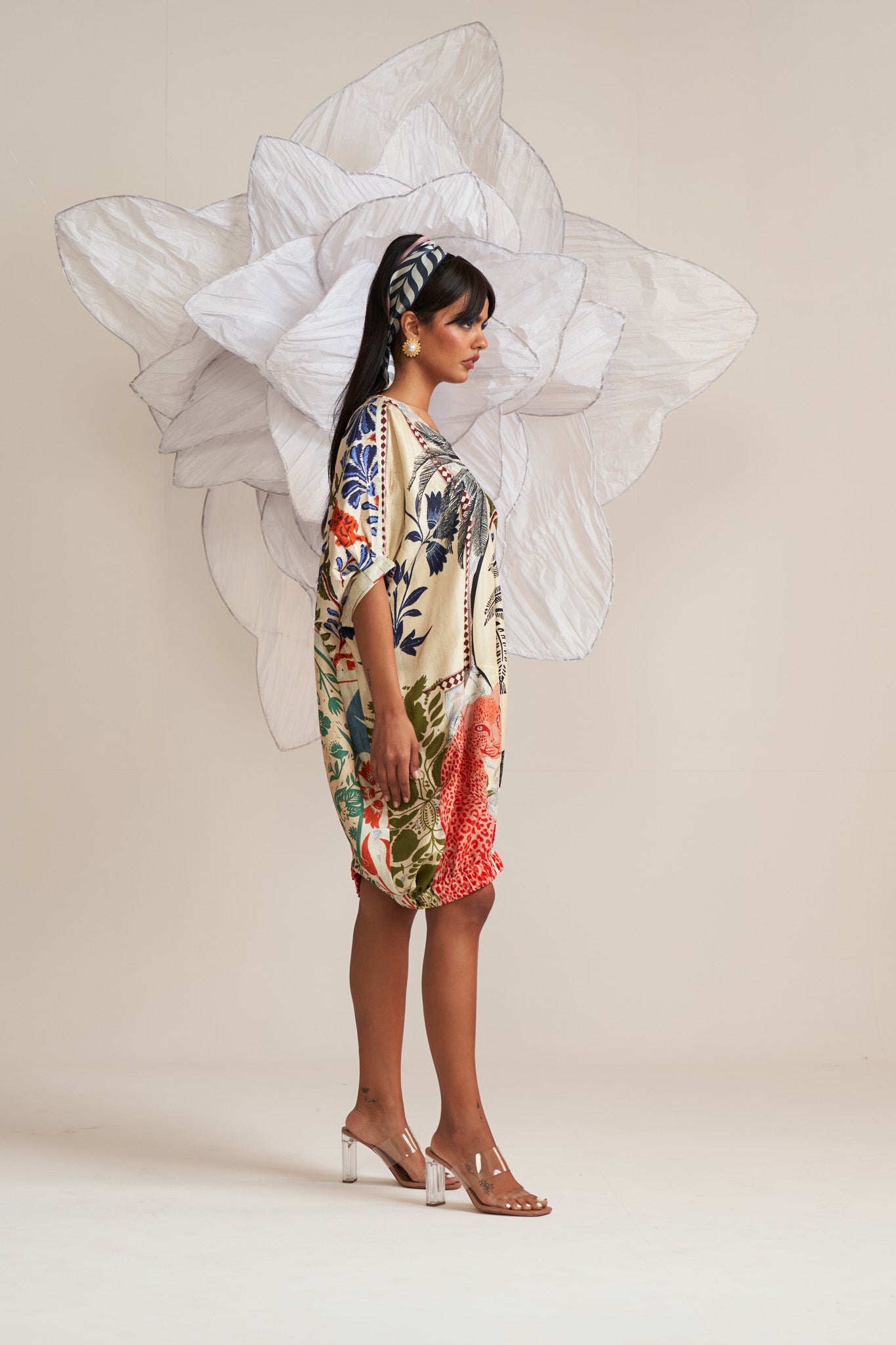 Dress with elasticated hem