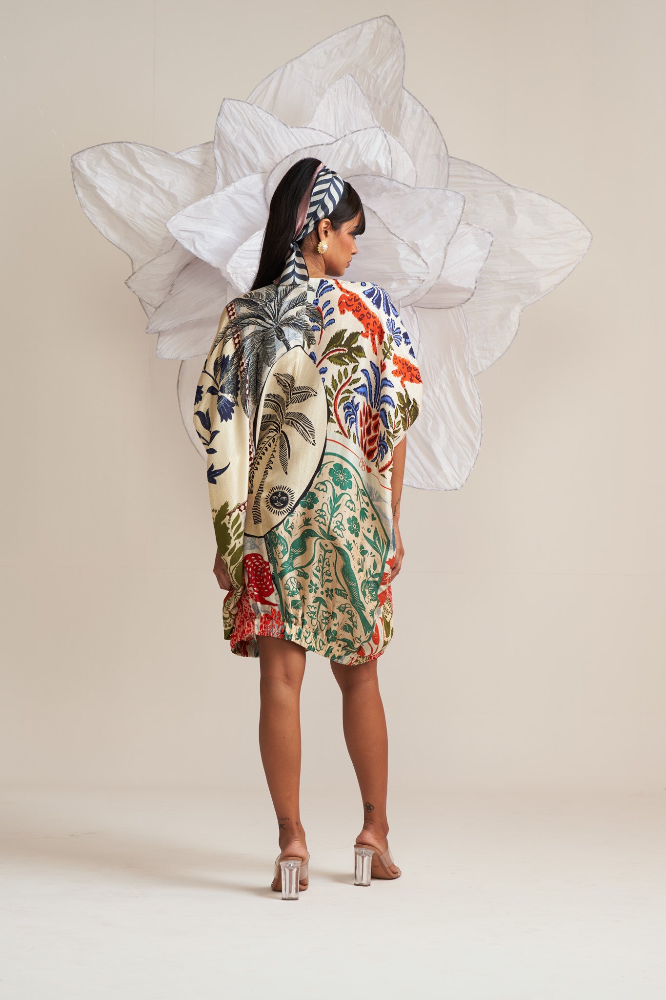 Dress with elasticated hem