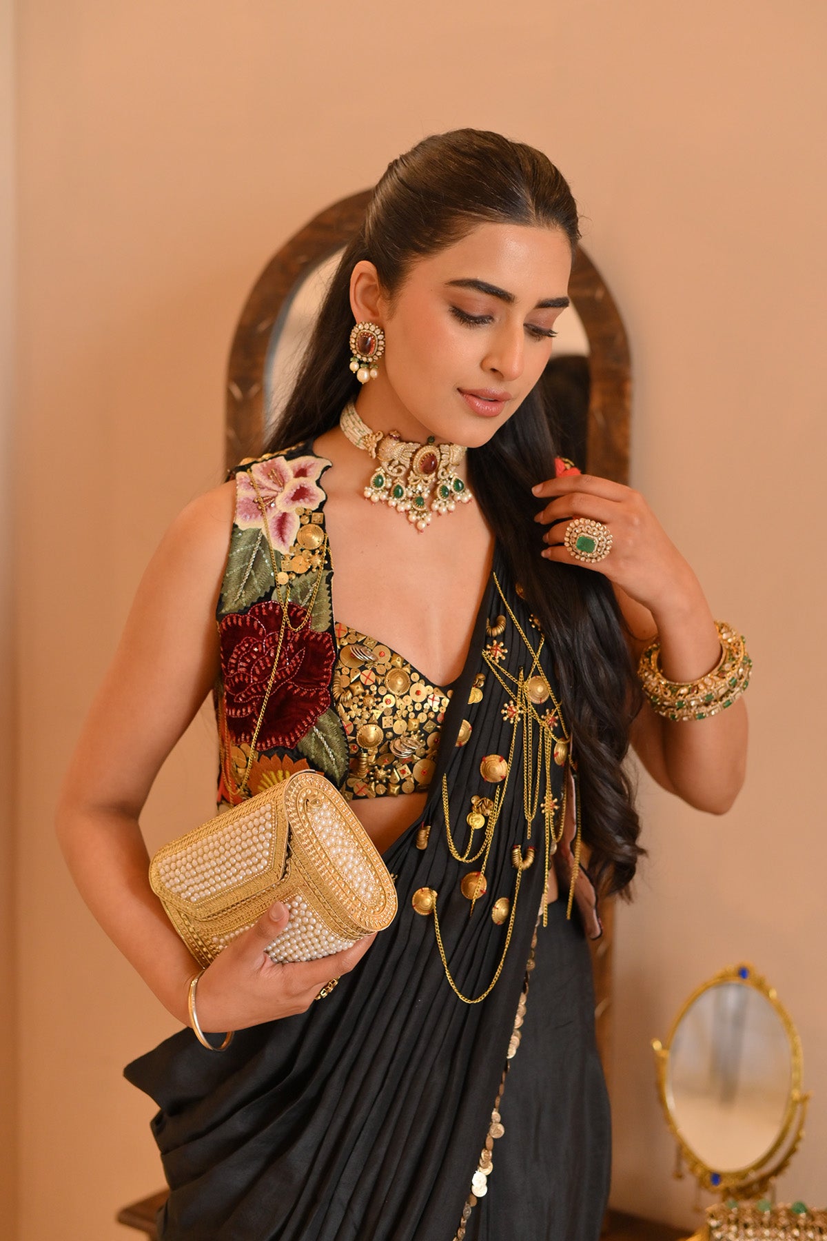 Bhavdeep Kaur In Vintage lily drape saree with bustier and jacket