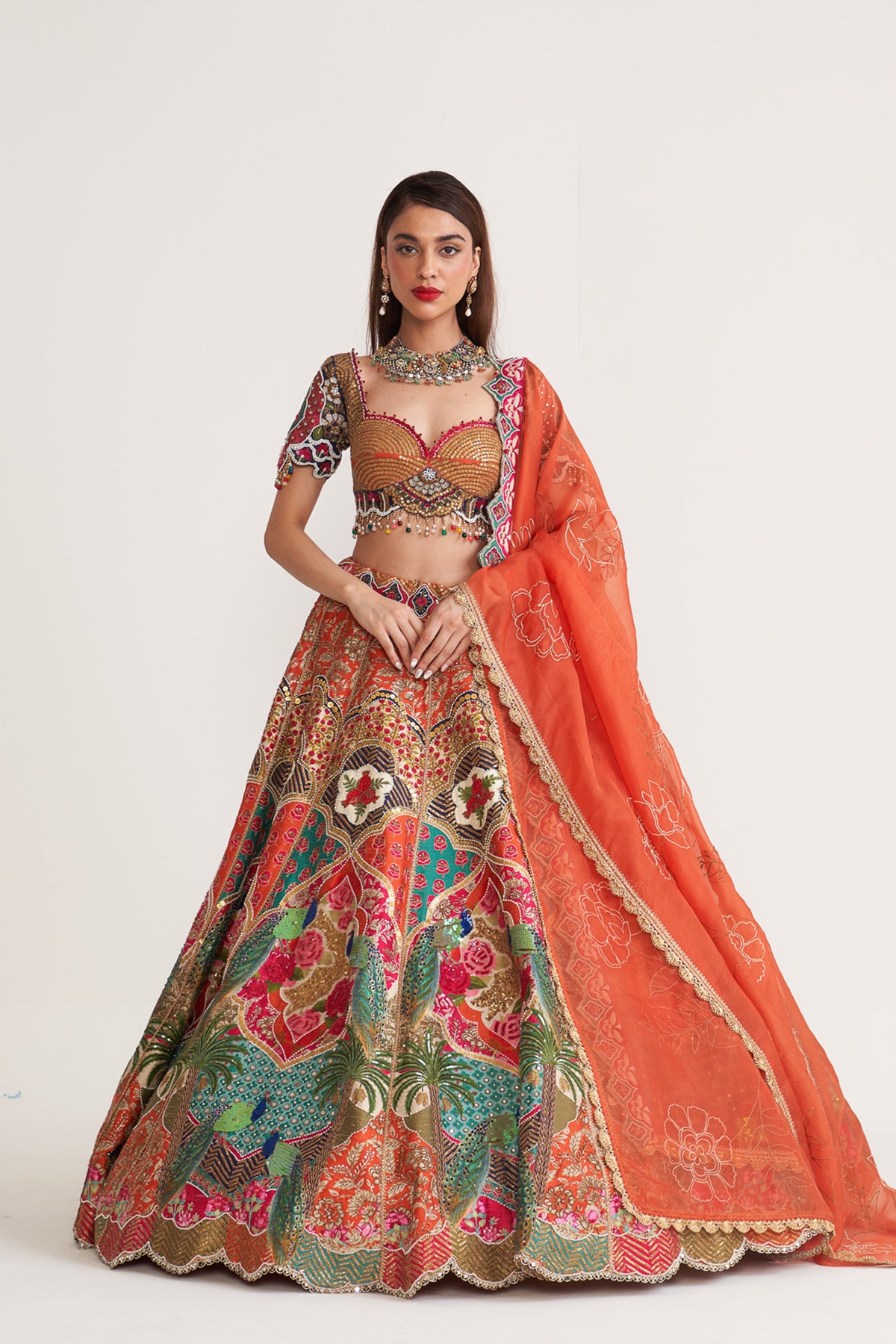 Orange & teal peacock lehenga
