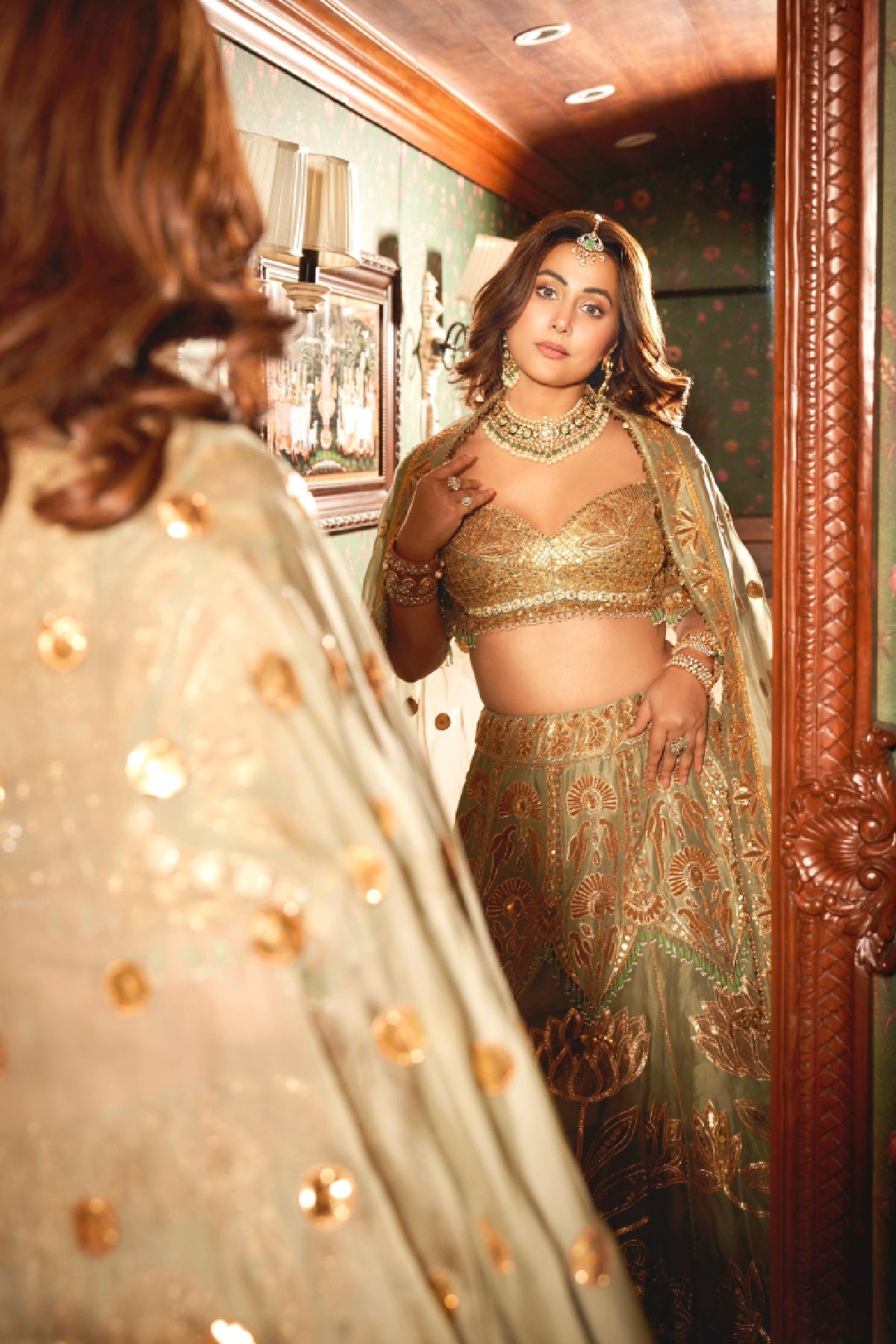 Hina khan in treasure organza lehenga- Green