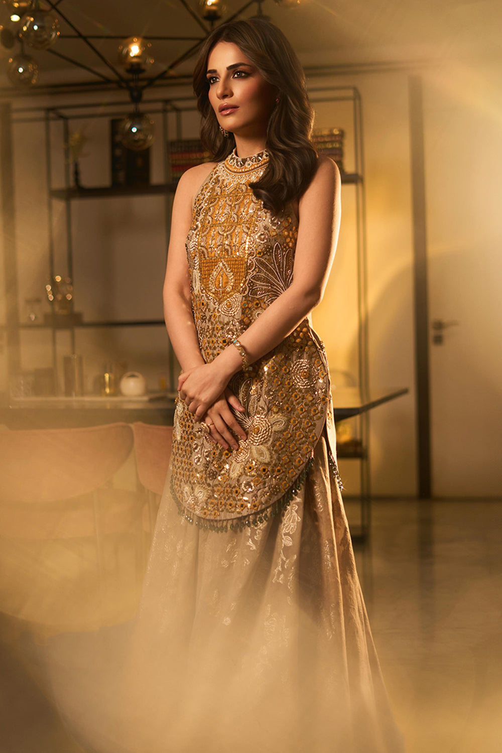 Radhika Madaan in Gold Azra sharara set