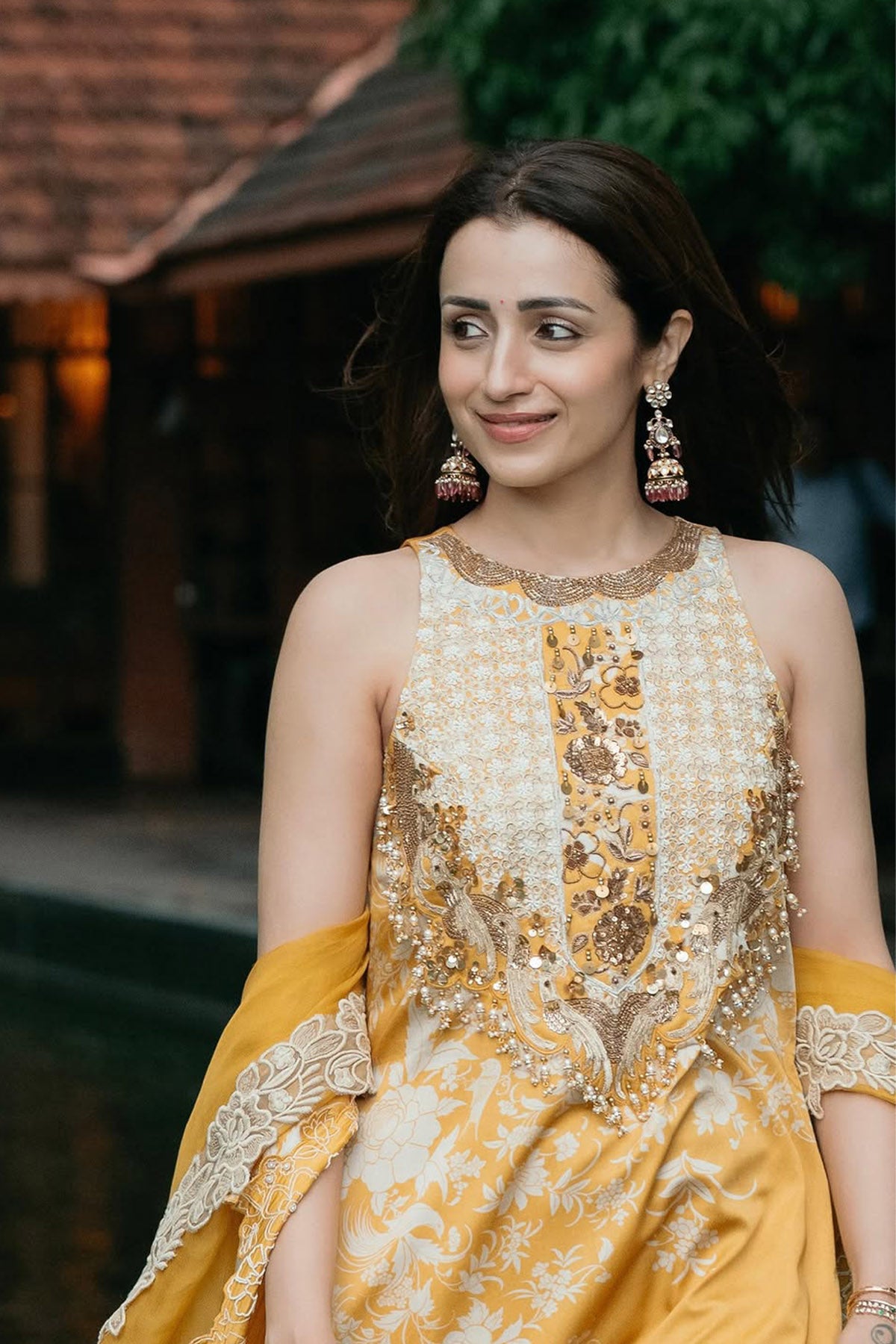 Trisha Krishnan Parsi yellow long suit set