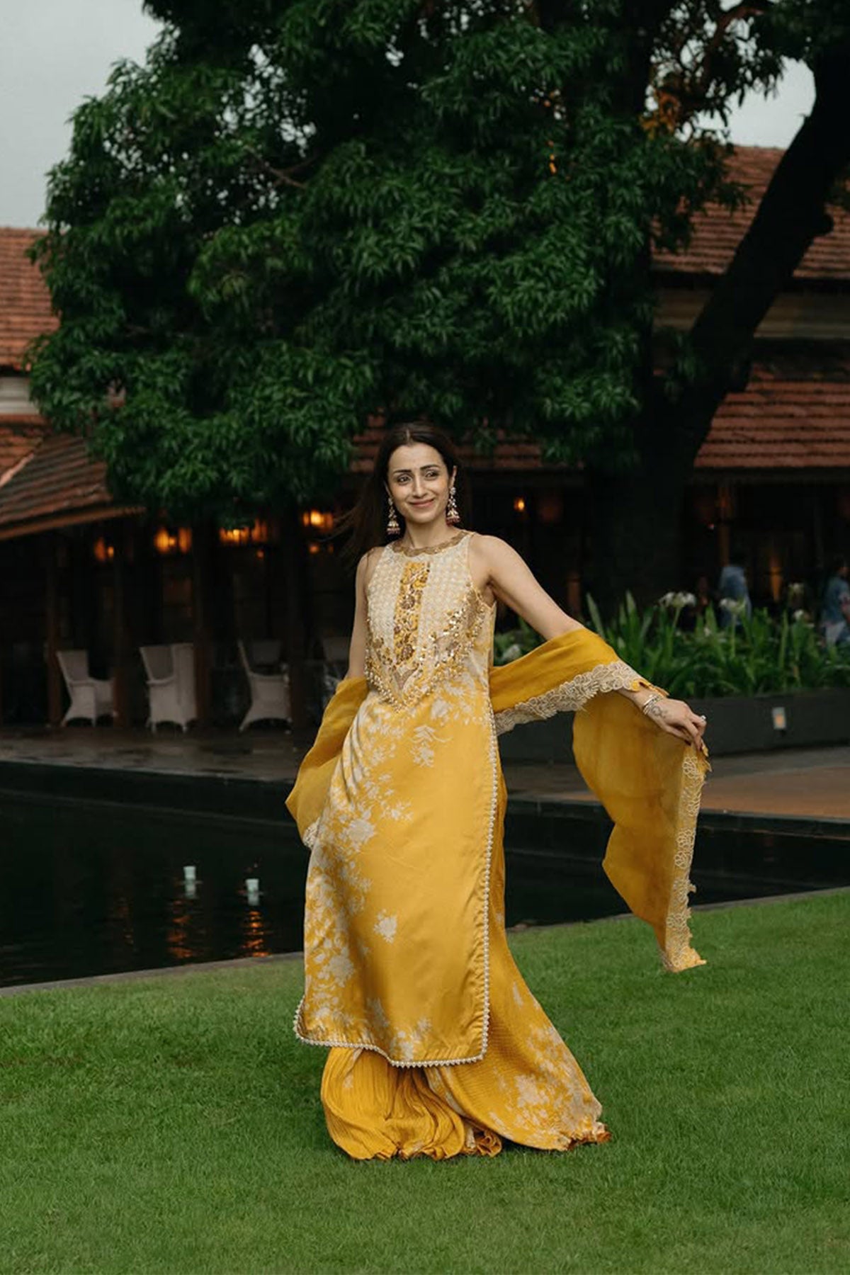 Trisha Krishnan Parsi yellow long suit set