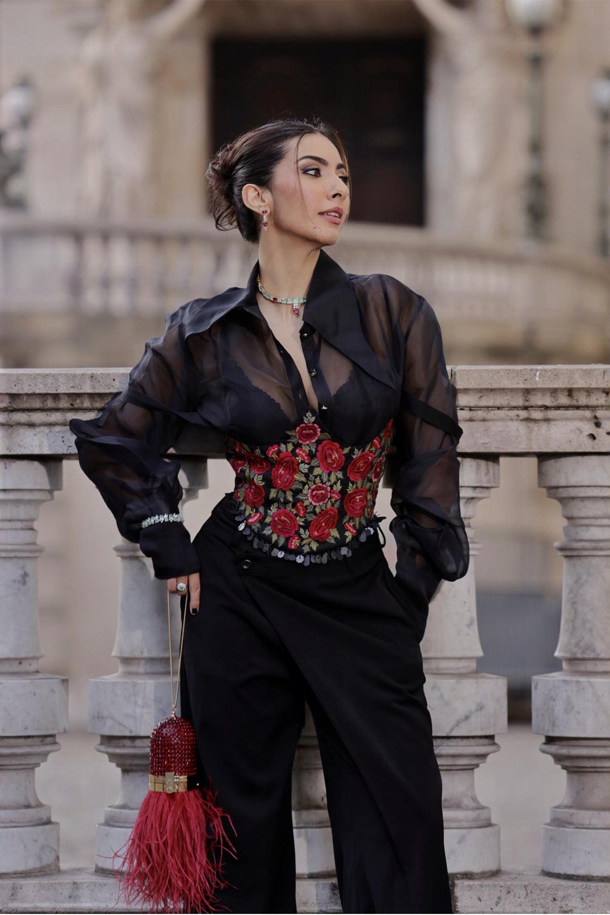 Niki Mehra in Trenchcoat with corset belt set