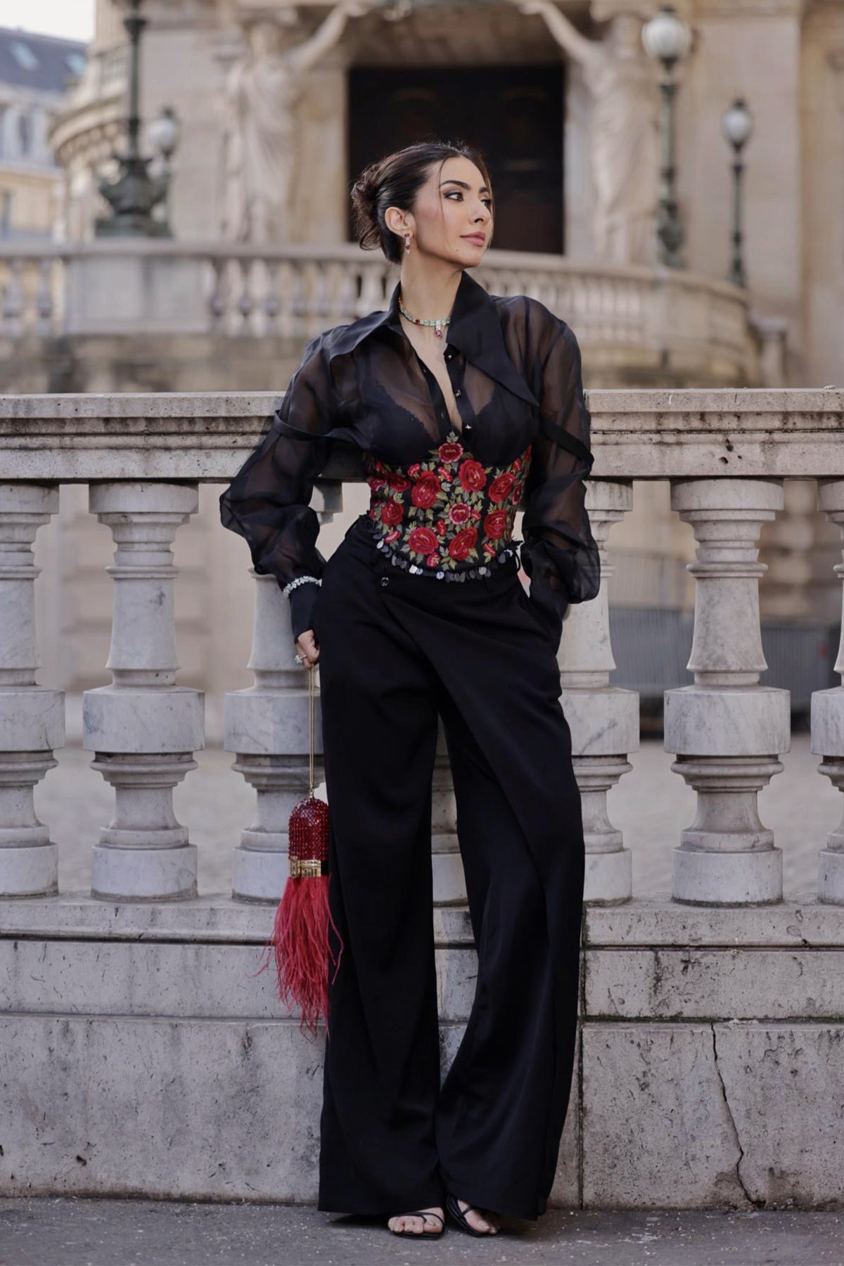 Niki Mehra in Trenchcoat with corset belt set