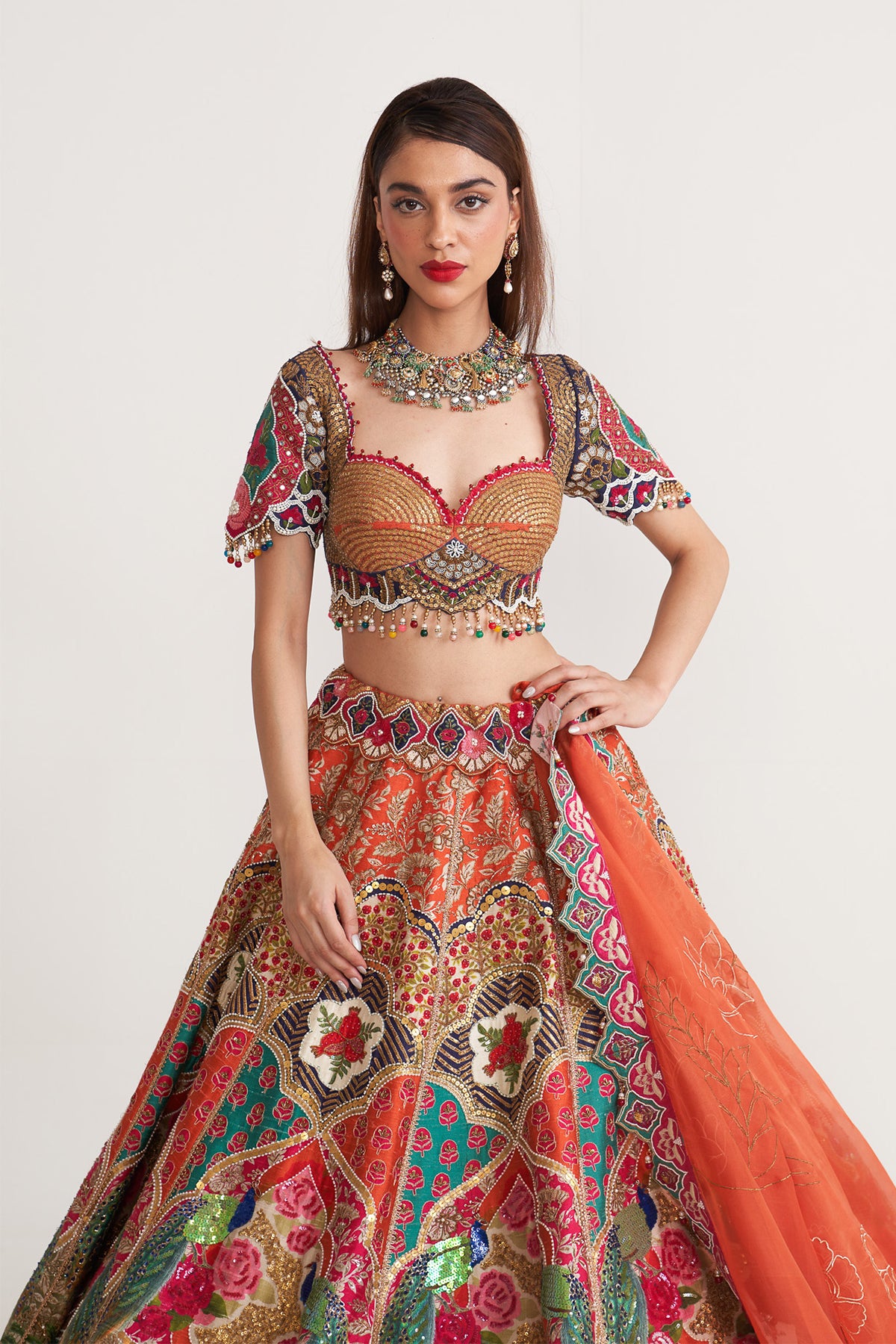Orange & teal peacock lehenga