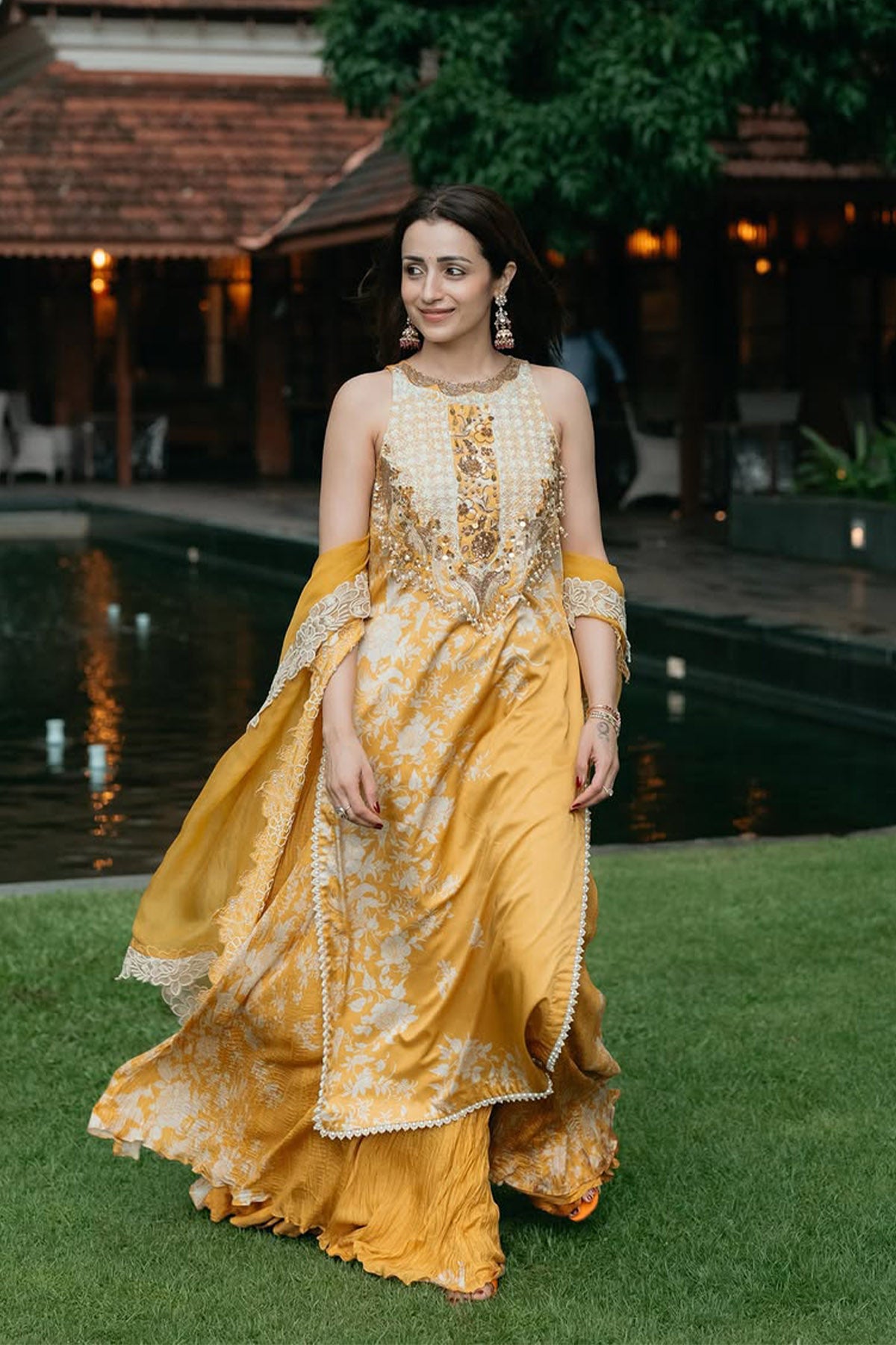 Trisha Krishnan Parsi yellow long suit set